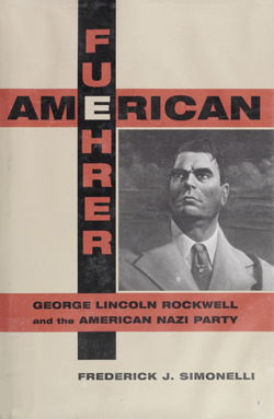 ภาพถ่ายขาวดำของร็อคเวลล์อยู่ใต้กากบาทสีแดงและดำ ตัวอักษร E ในคำว่า American และ Fuehrer ตัดกัน